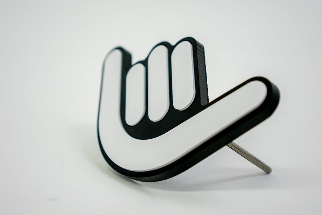 Shaka Grille Badge